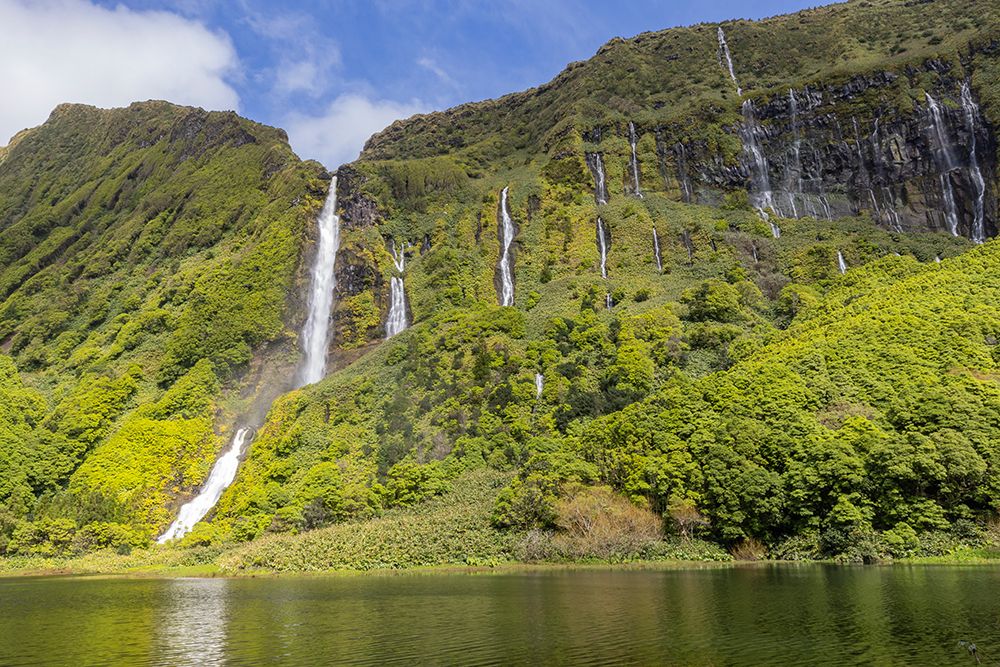 Azores, Portugal. Waterfall dropping into Lagoa dos Patos on Flores Island. art print by Emily M. Wilson for $57.95 CAD
