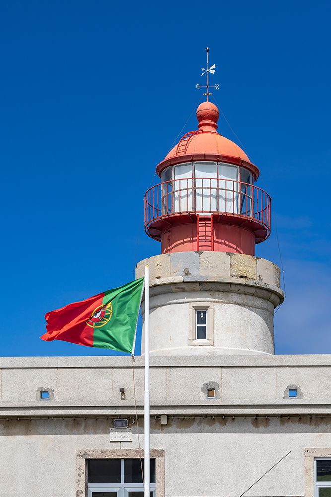 Ponta Delgada, Azores, Portugal. Portuguese flag and Albarnaz Lighthouse on Flores Island. art print by Emily M. Wilson for $57.95 CAD
