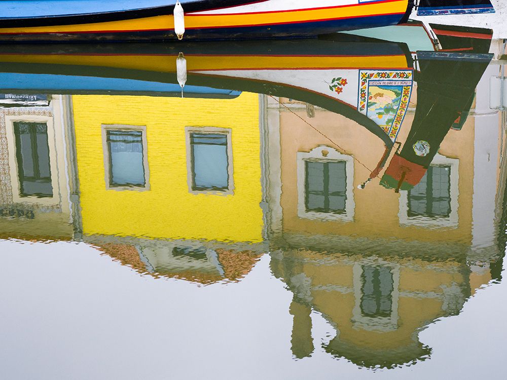 Portugal-Aveiro-Reflection of colorful buildings and painted Moliceiro boats in the canal art print by Julie Eggers for $57.95 CAD