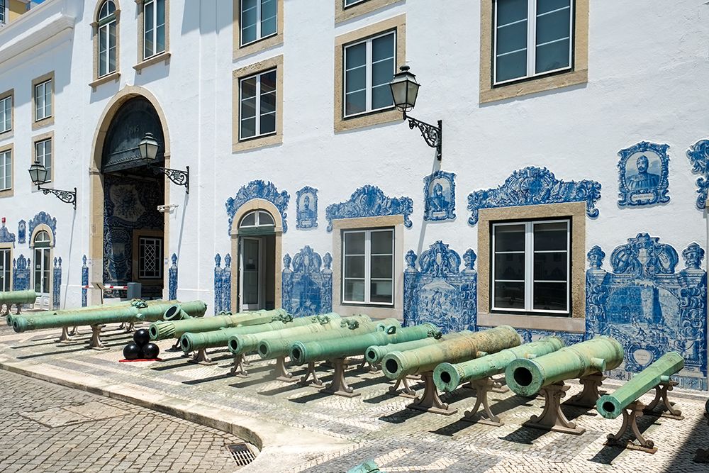 Lisbon, Portugal. Old canons line the courtyard in a former military headquarter. art print by Julien McRoberts for $57.95 CAD