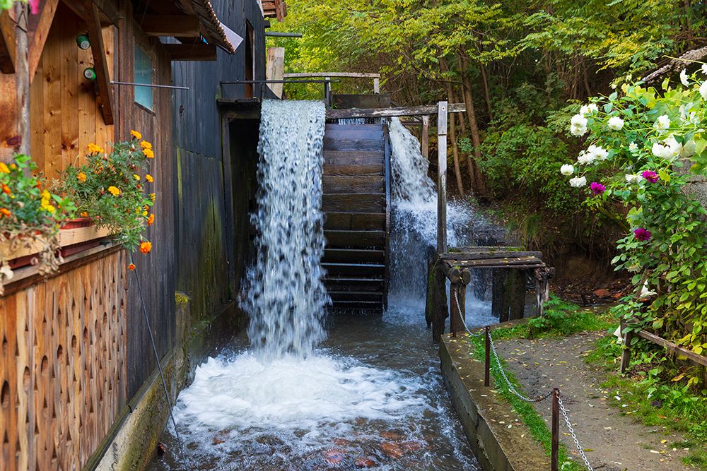 Romania, Transylvania, Fagaras. Ohaba. Oldest grist mill with water wheel. The miller and wife. art print by Emily M. Wilson for $57.95 CAD