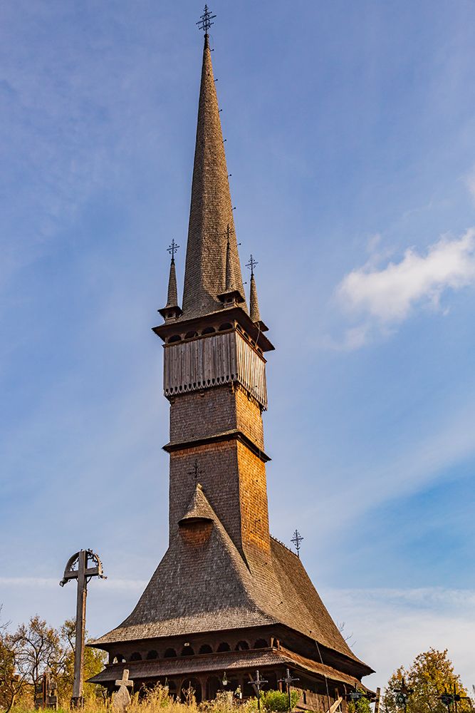 Romania, Maramures County, Surdesti. Eastern Orthodox, church of Lemn. Spire and steeple. art print by Emily M. Wilson for $57.95 CAD