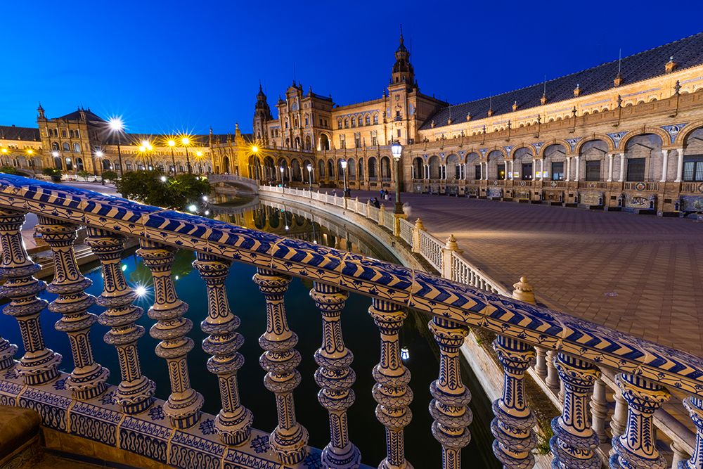 Spain-Seville. Plaza de Espana lit at sunset. art print by Jaynes Gallery for $57.95 CAD