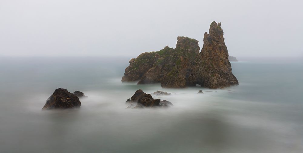 Spain. Ocean sea stack on misty coastline. art print by Jaynes Gallery for $57.95 CAD