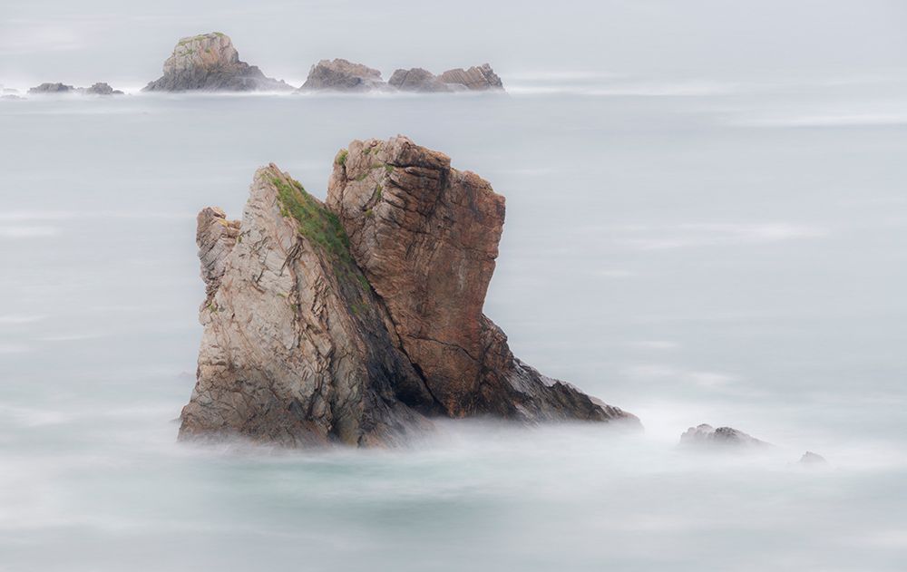 Spain. Ocean sea stack on misty coastline. art print by Jaynes Gallery for $57.95 CAD
