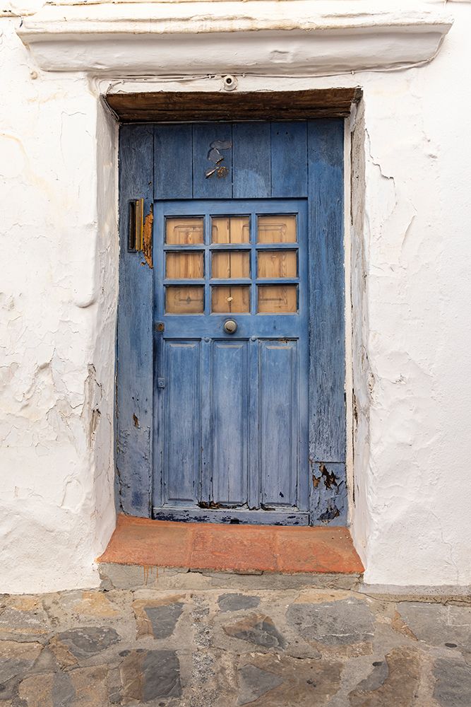 Casares, Malaga, Andalusia, Spain. A weather blue door on a white stucco house. art print by Emily M. Wilson for $57.95 CAD