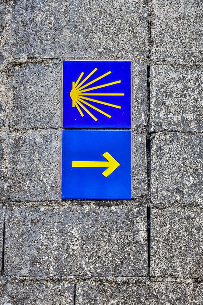 Spain-Galicia Yellow arrow and clam shell along the Camino de Santiago art print by Hollice Looney for $57.95 CAD