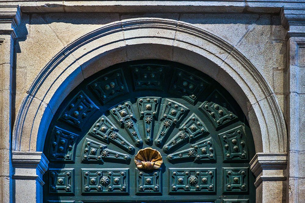 Spain-Galicia Cathedral in Santiago de Compostela-doorway highlighting the scallop shell art print by Hollice Looney for $57.95 CAD