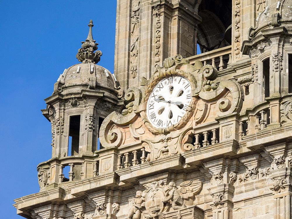 Close-up of the ancient clock on Berenguela tower of Santiago de Compostela Cathedral art print by Julie Eggers for $57.95 CAD