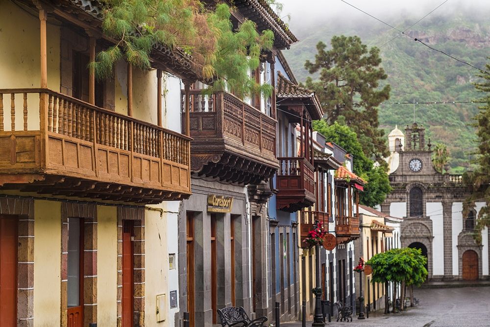 Spain-Canary Islands-Gran Canaria Island-Teror-main street and traditional houses art print by Walter Bibikow for $57.95 CAD