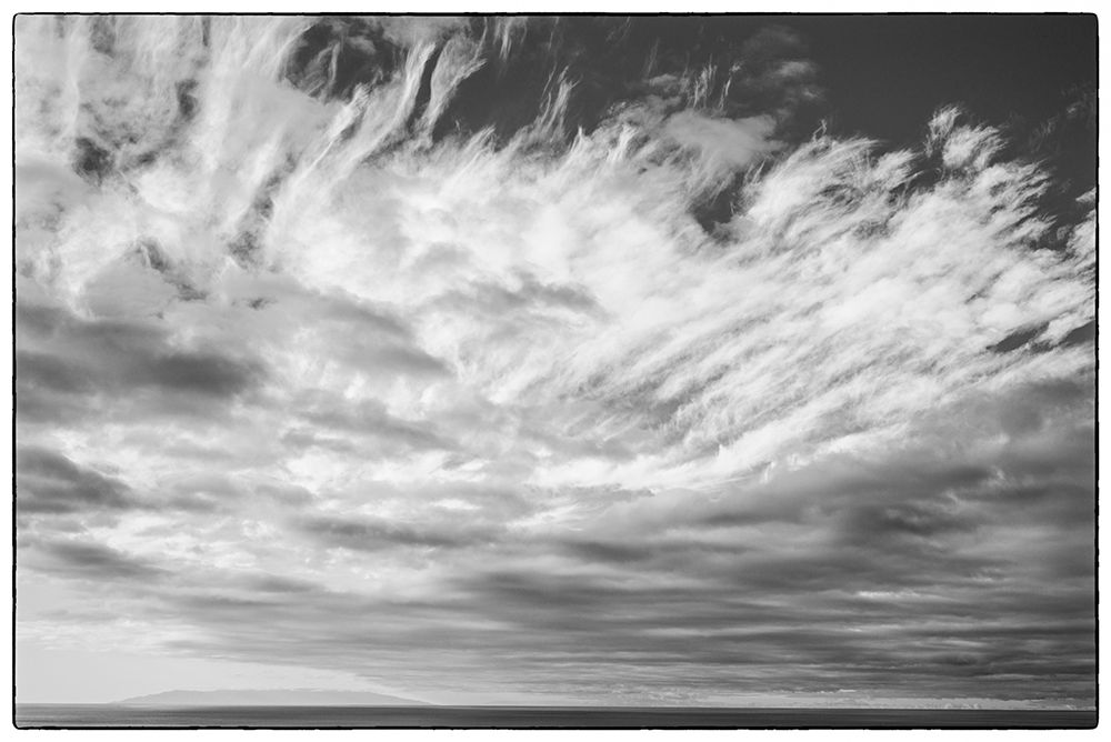 Canary Islands-La Palma Island-Puerto Naos-dramatic sky and view towards El Hierro Island art print by Walter Bibikow for $57.95 CAD