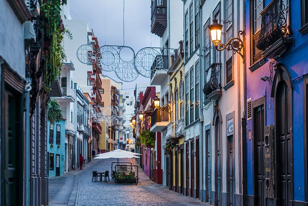 Canary Islands-La Palma Island-Santa Cruz de la Palma-Calle ODaly-street at dusk art print by Walter Bibikow for $57.95 CAD