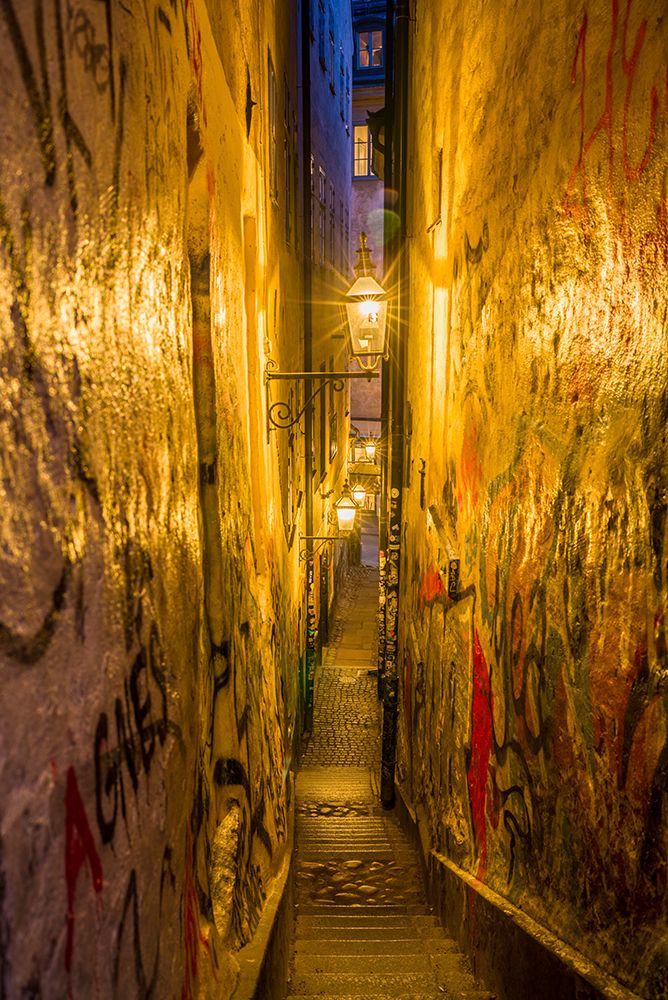 Sweden-Stockholm-Gamla Stan-Old Town-Marten Trotzigs Grand-narrowest street in Stockholm-evening art print by Walter Bibikow for $57.95 CAD