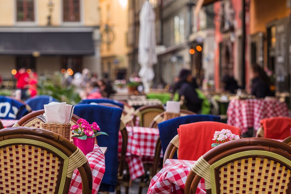Sweden-Stockholm-Gamla Stan-Old Town-cafe tables art print by Walter Bibikow for $57.95 CAD