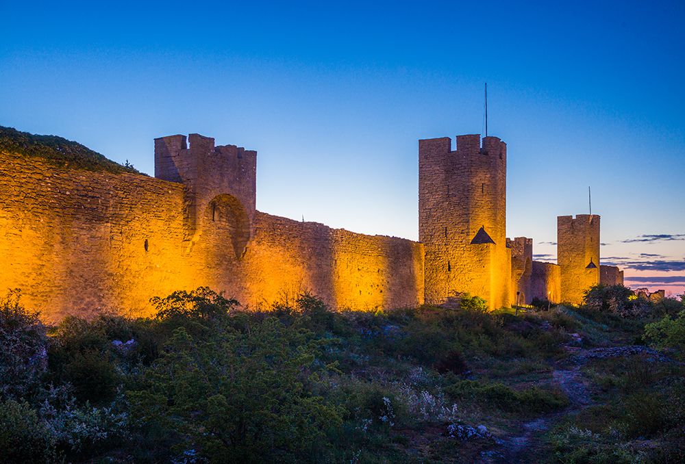 Sweden-Gotland Island-Visby-12th century city wall-most complete medieval city wall in Europe-dusk art print by Walter Bibikow for $57.95 CAD