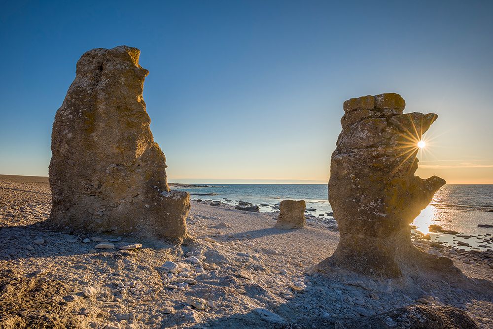 Sweden-Faro Island-Langhammars Area-Langhammar coastal limestone rauk rock-sunset art print by Walter Bibikow for $57.95 CAD