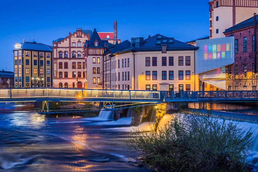Sweden-Norrkoping-early Swedish industrial town-factory buildings-dusk art print by Walter Bibikow for $57.95 CAD