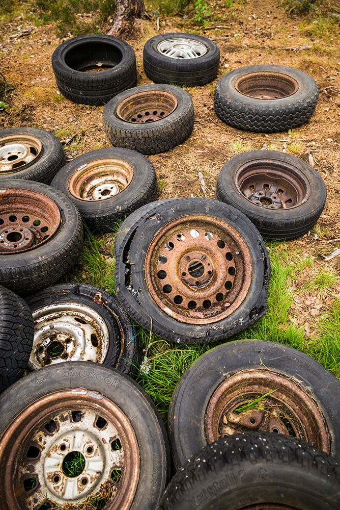 Sweden-Smaland-Ryd-Kyrko Mosse Car Cemetery-former junkyard now pubic park-old tires art print by Walter Bibikow for $57.95 CAD