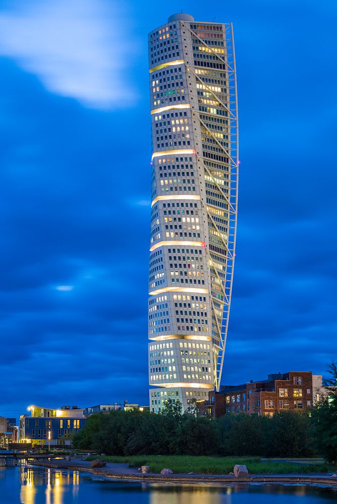 Sweden-Scania-Malmo-Turning Torso building-designed by architect Santiago Calatrava-2005-dusk art print by Walter Bibikow for $57.95 CAD