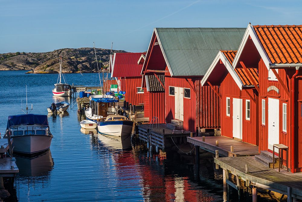 Sweden-Bohuslan-Kungshamn-red fishing shacks in the Fisketangen-old fishermans neighborhood art print by Walter Bibikow for $57.95 CAD