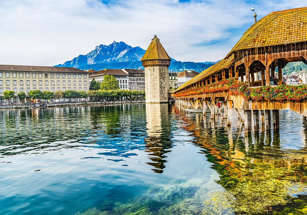 Kapellbrucke over Reuss River-Lucerne-Switzerland. Built in 1365 almost burned down in 1993. art print by William Perry for $57.95 CAD