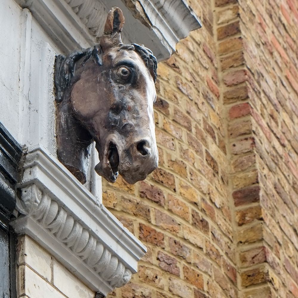 London, England, Great Britain. Head detail on building in old tannery district. art print by Julien McRoberts for $57.95 CAD