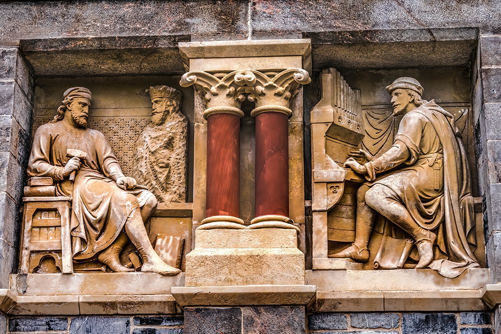 Organist statues on facade of Guildhall Building, Plymouth, Devon, England. art print by William Perry for $57.95 CAD