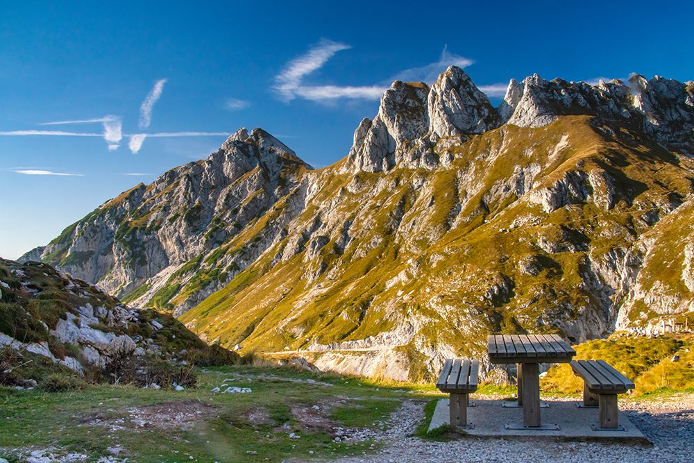 Slovenia, Triglav National Park. Picnic bench with view of Julian Alps. art print by Jaynes Gallery for $57.95 CAD