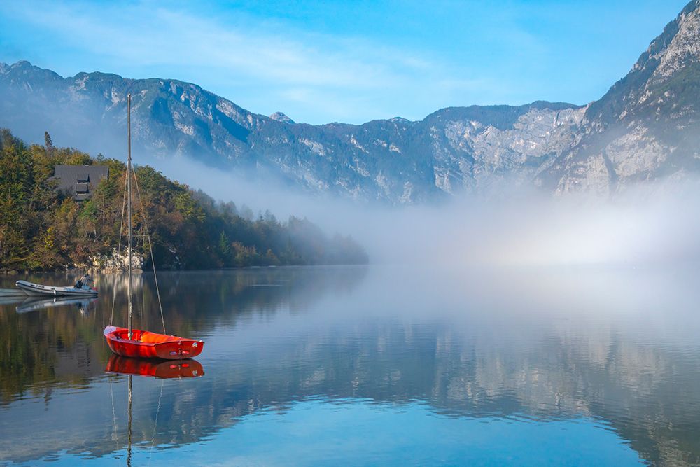 Slovenia, Lake Bohinj. Lake boats on foggy morning. art print by Jaynes Gallery for $57.95 CAD
