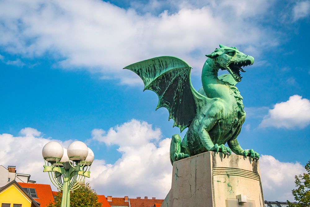 Slovenia, Ljubljana. Statue on Dragon Bridge. art print by Jaynes Gallery for $57.95 CAD
