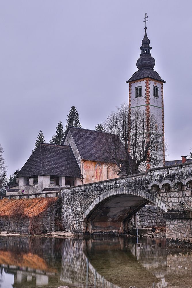 Slovenia-Upper Carniola-Ribcev Laz-Lake Bohinj-Church of St John the Baptist in early morning light art print by Hollice Looney for $57.95 CAD