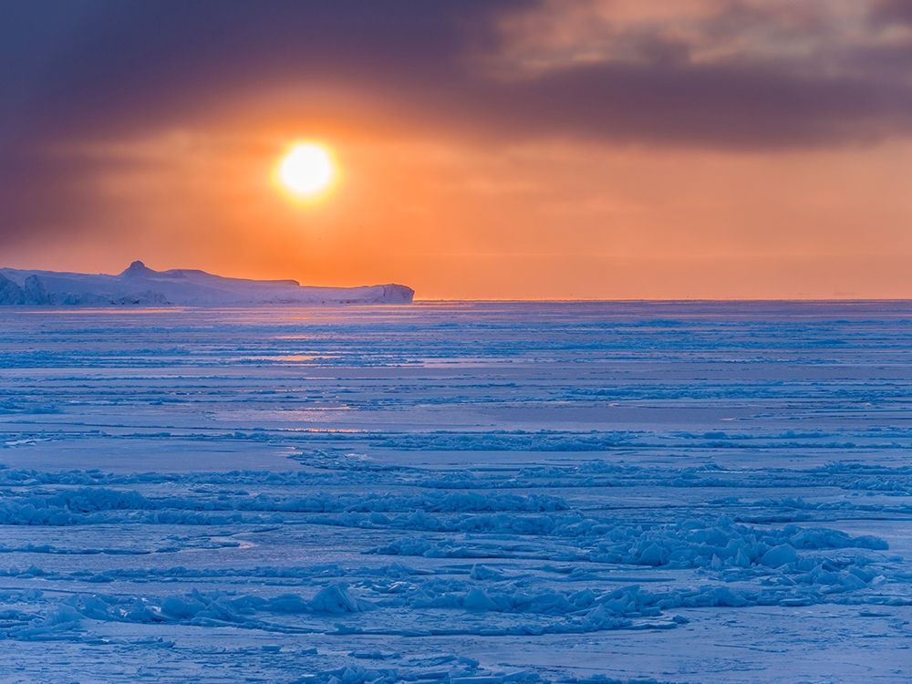 Sunset during winter at the Ilulissat Fjord-located in the Disko Bay in West Greenland art print by Martin Zwick for $57.95 CAD