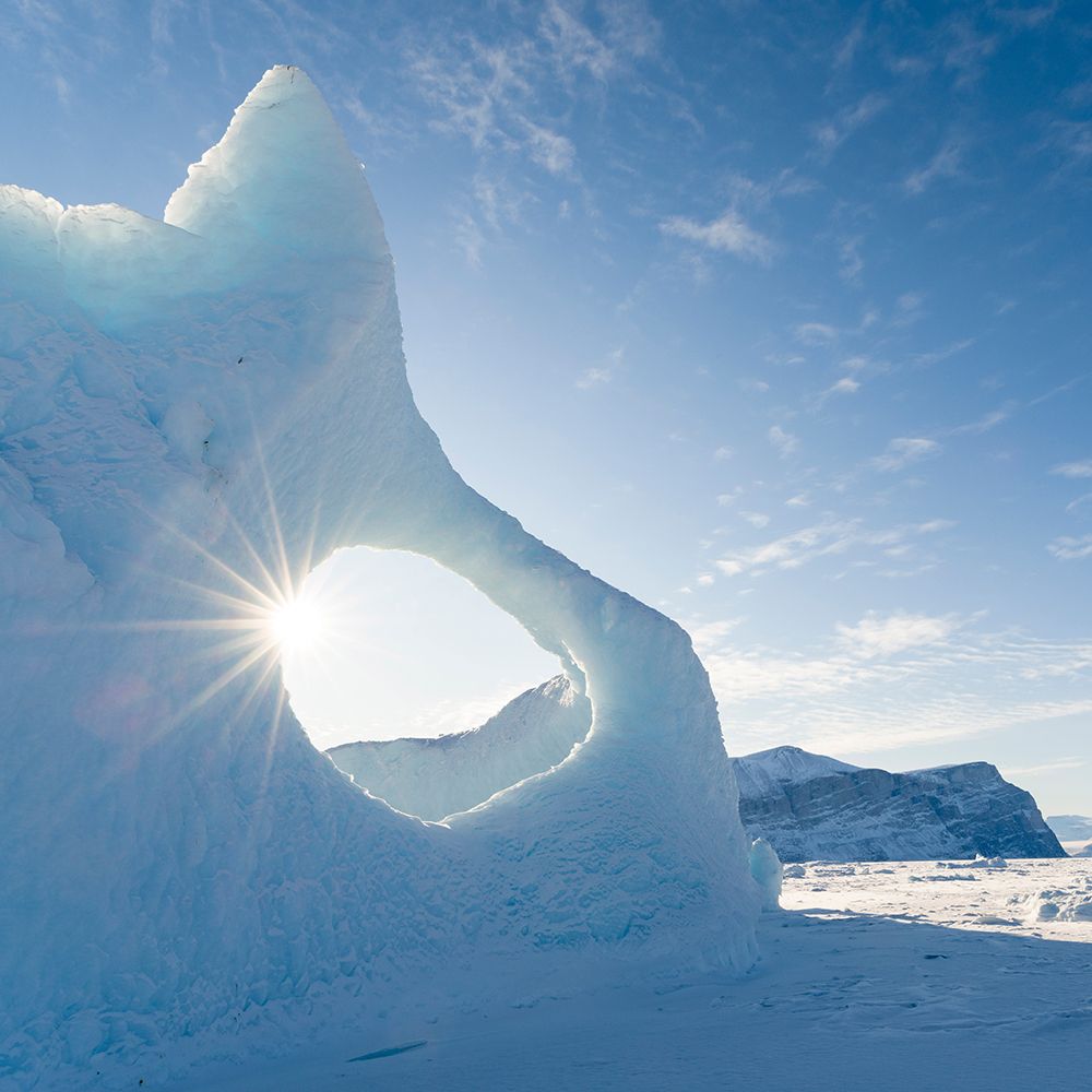 Iceberg frozen into the sea ice of the Uummannaq fjord system during winter-Greenland-Danish Territ art print by Martin Zwick for $57.95 CAD