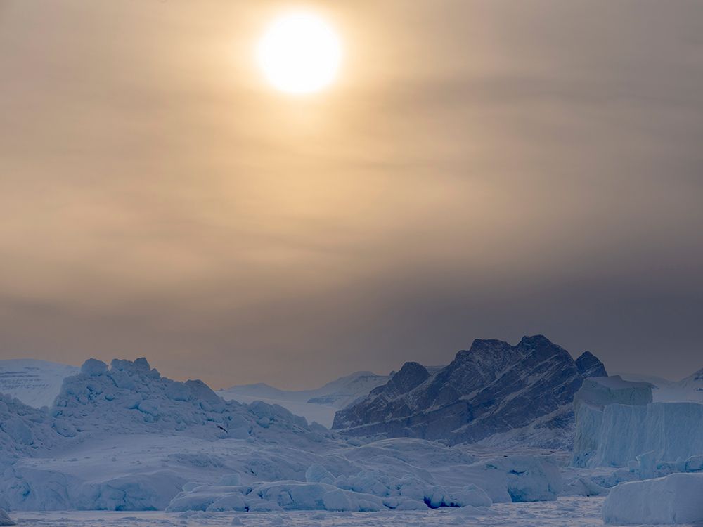Icebergs frozen into the sea ice of the Uummannaq fjord system during winter-Greenland-Danish Terri art print by Martin Zwick for $57.95 CAD