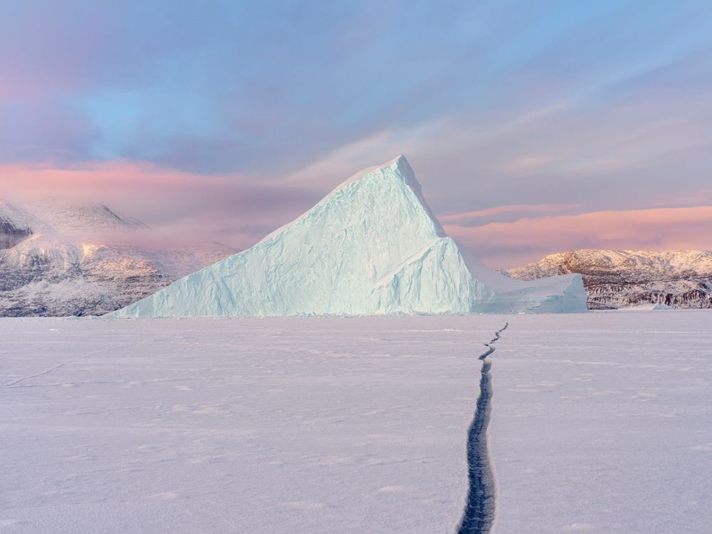 Icebergs in front of Storen Island-frozen into the sea ice of the Uummannaq fjord system during win art print by Martin Zwick for $57.95 CAD