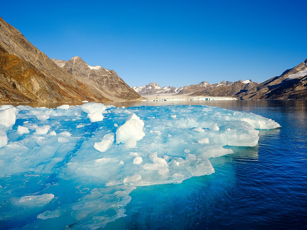Iceberg in front of Knud Rasmussen Glacier-Sermiligaaq Fjord- Ammassalik- Danish Territory. art print by Martin Zwick for $57.95 CAD
