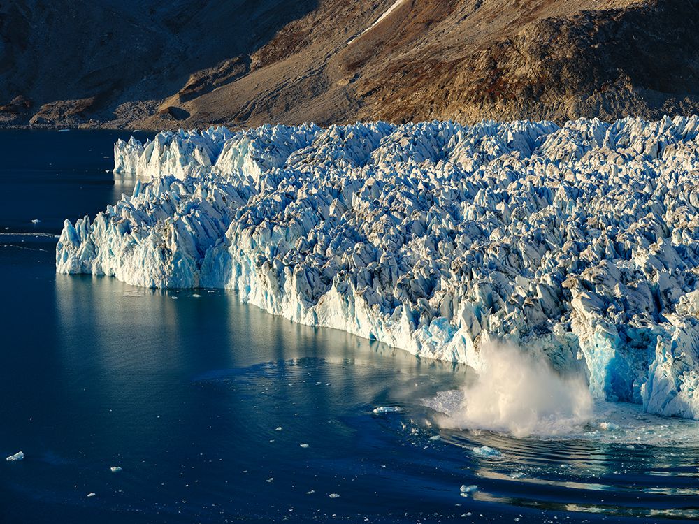 Ice calving. Knud Rasmussen Glacier-Sermiligaaq Fjord- Ammassalik- Danish Territory. art print by Martin Zwick for $57.95 CAD