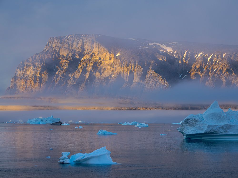Midnight sun at Storoen Island. Uummannaq Fjord, northwest of Greenland beyond the arctic circle. art print by Martin Zwick for $57.95 CAD