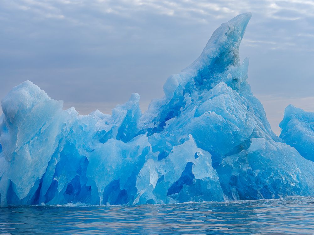 Icebergs northeast of Isertoq close to Sermilik Icefjord in Ammassalik area, northeast of Greenland art print by Martin Zwick for $57.95 CAD