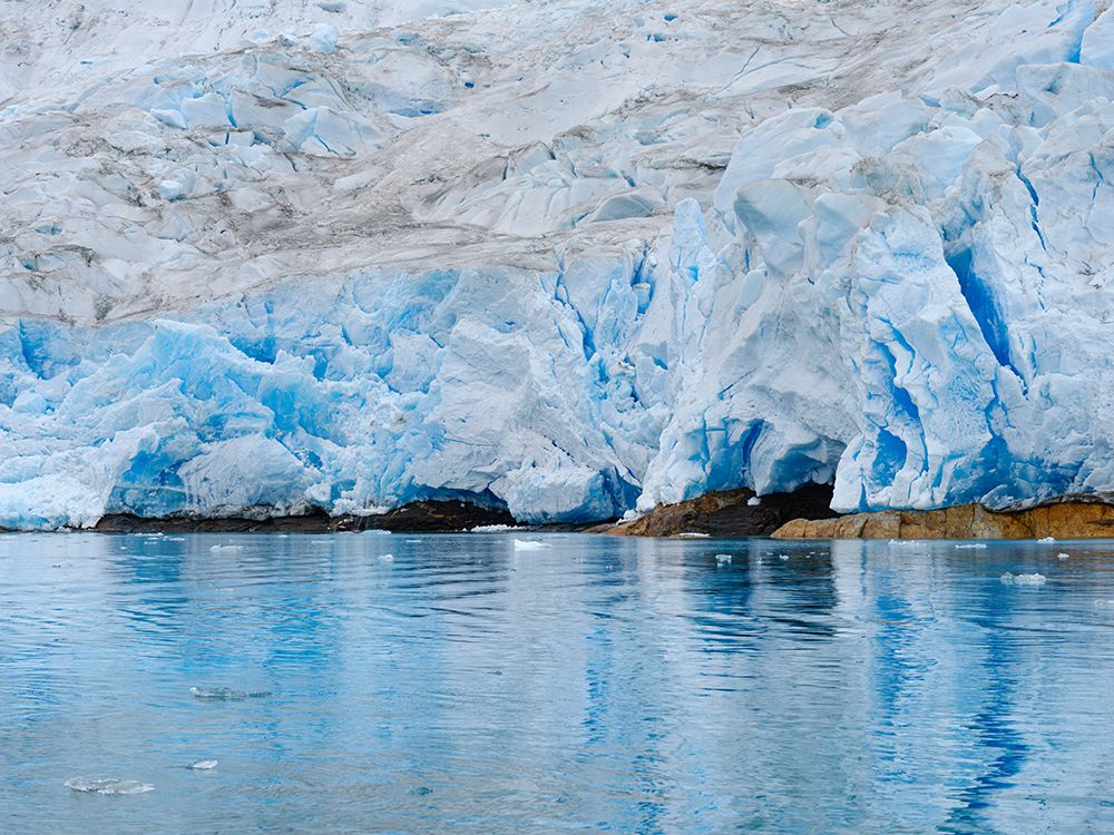 Glacier northeast of Isertoq near Tasiilaq close to Sermilik Icefjord in Ammassalik area, Greenland art print by Martin Zwick for $57.95 CAD