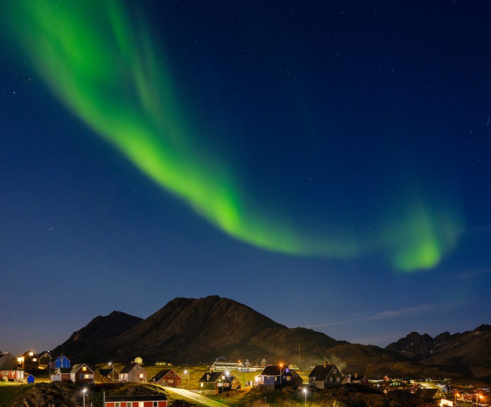 Aurora over the town. Town Tasiilaq (former Ammassalik), the biggest town in Greenland., autumn art print by Martin Zwick for $57.95 CAD