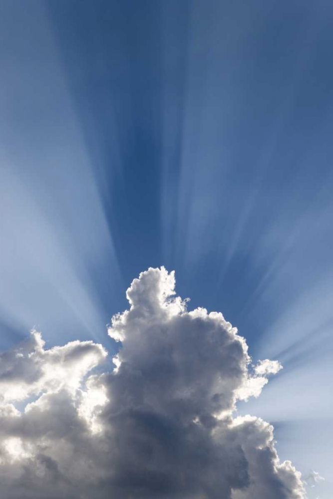 Crepuscular or Gods rays streak past cloud art print by Don Paulson for $57.95 CAD