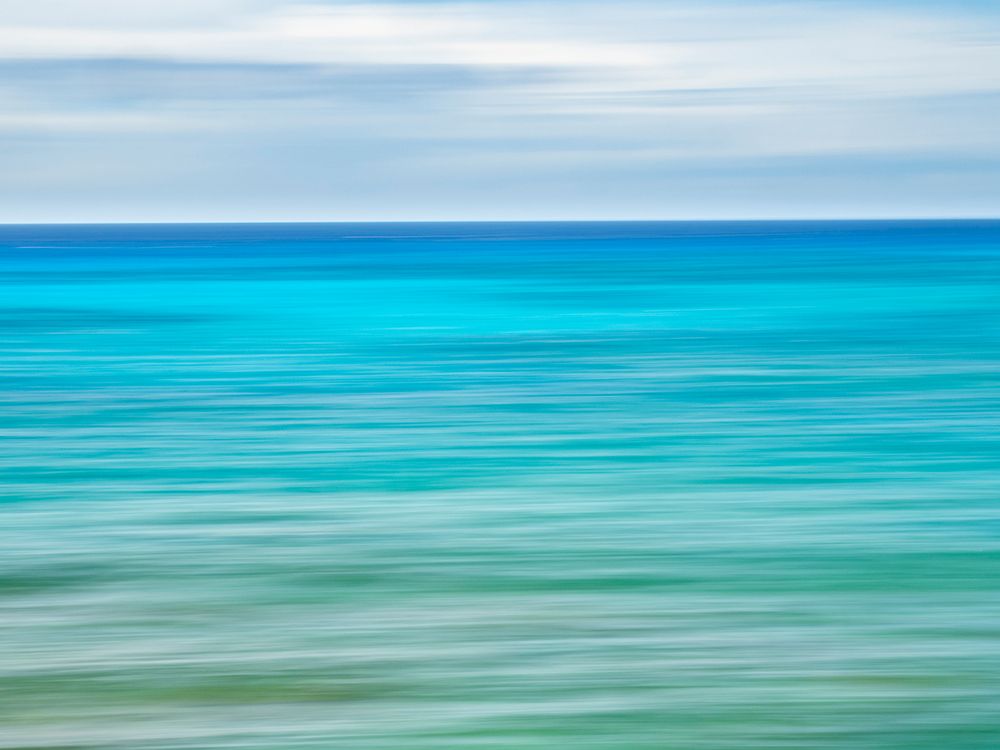 Blurred abstract of blue and green sea and sky. art print by Merrill Images for $57.95 CAD