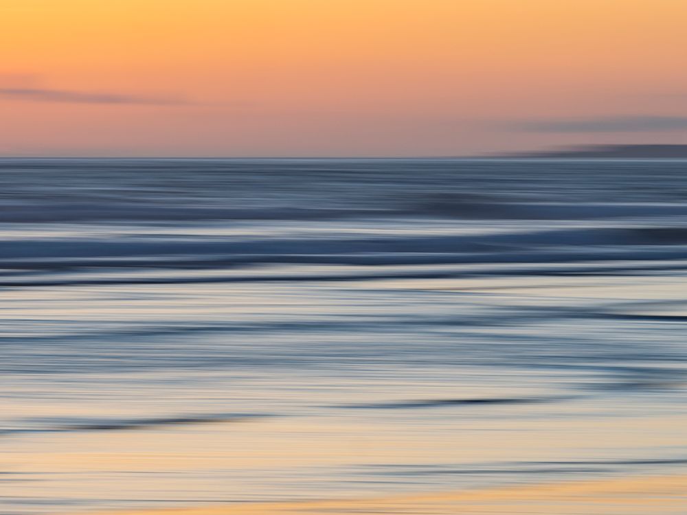 Abstract blur of sunset sea and beach. art print by Merrill Images for $57.95 CAD