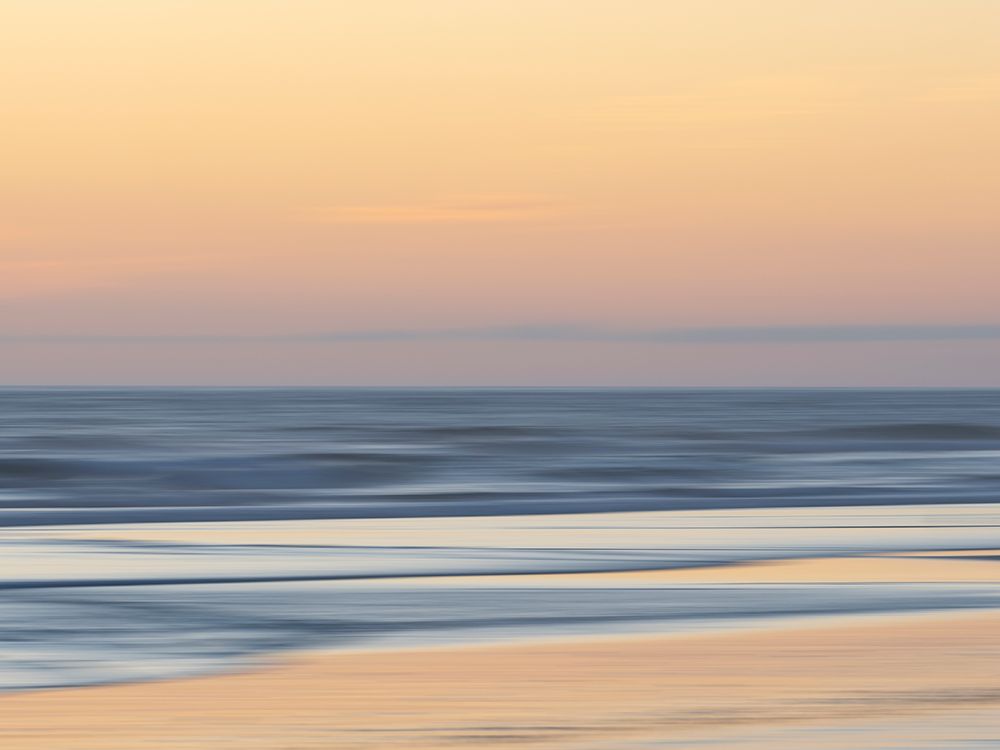 Abstract blur of sunset sea and beach. art print by Merrill Images for $57.95 CAD