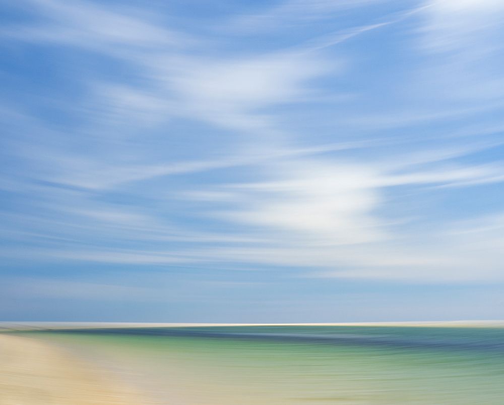 Blur of beach, clouds, and sky. art print by Merrill Images for $57.95 CAD