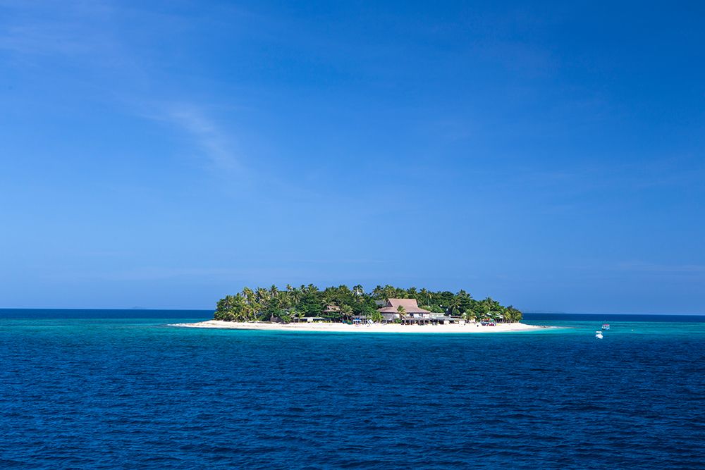 Fiji. Boats head towards Beachcomber Island-in the Mamanuca Island chain. art print by Micah Wright for $57.95 CAD
