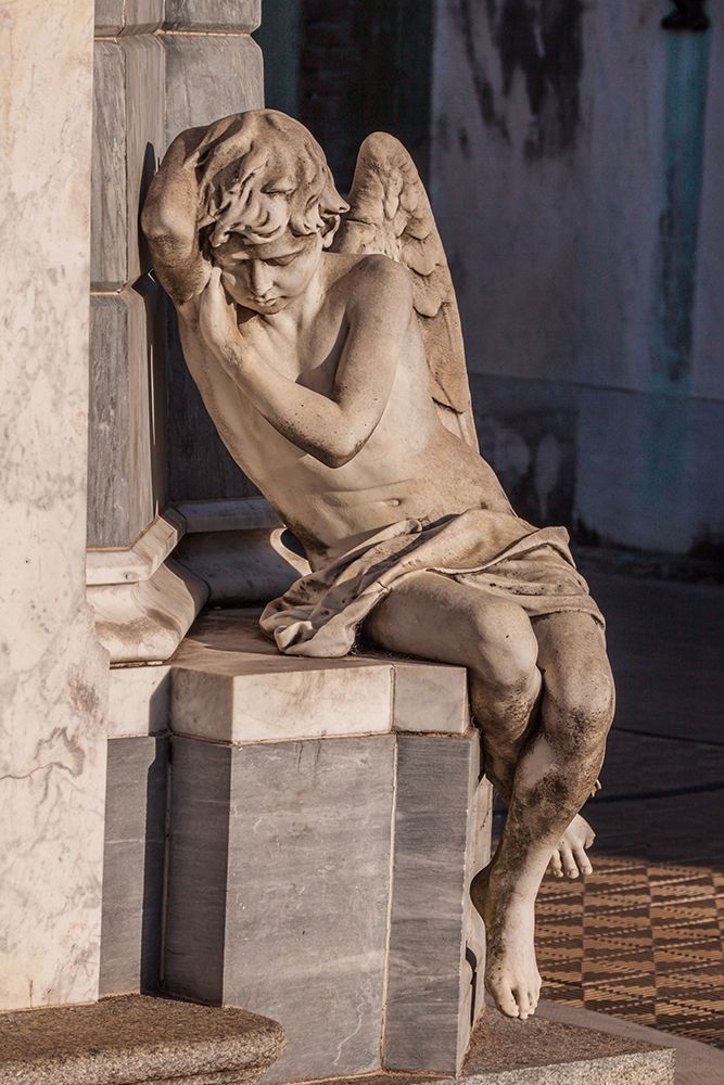 Argentina- Buenos Aires. Statue of an angel at the entrance to a tomb in Recoleta Cemetery. art print by Tom Haseltine for $57.95 CAD