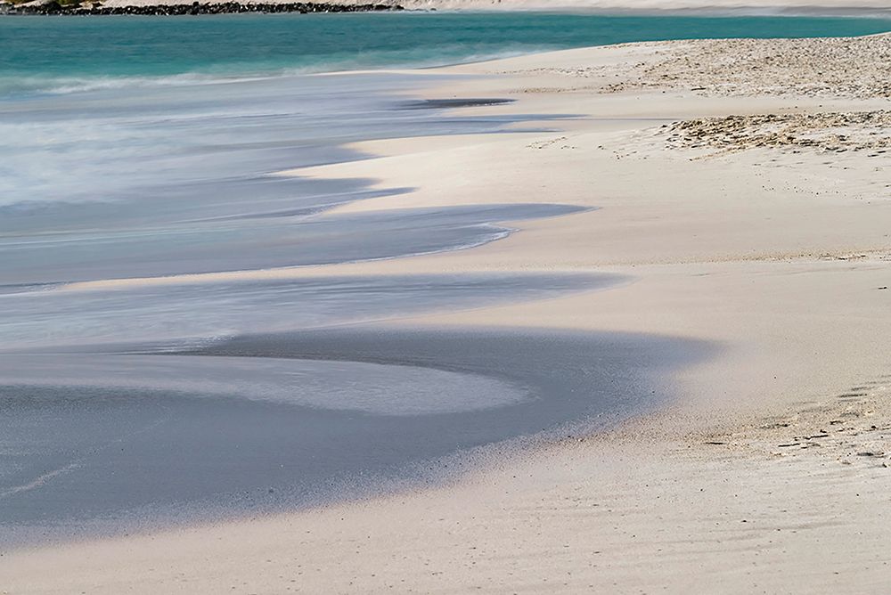 Surf pattern washing up on white sandy beach-Espanola Island-Galapagos Islands-Ecuador art print by Adam Jones for $57.95 CAD