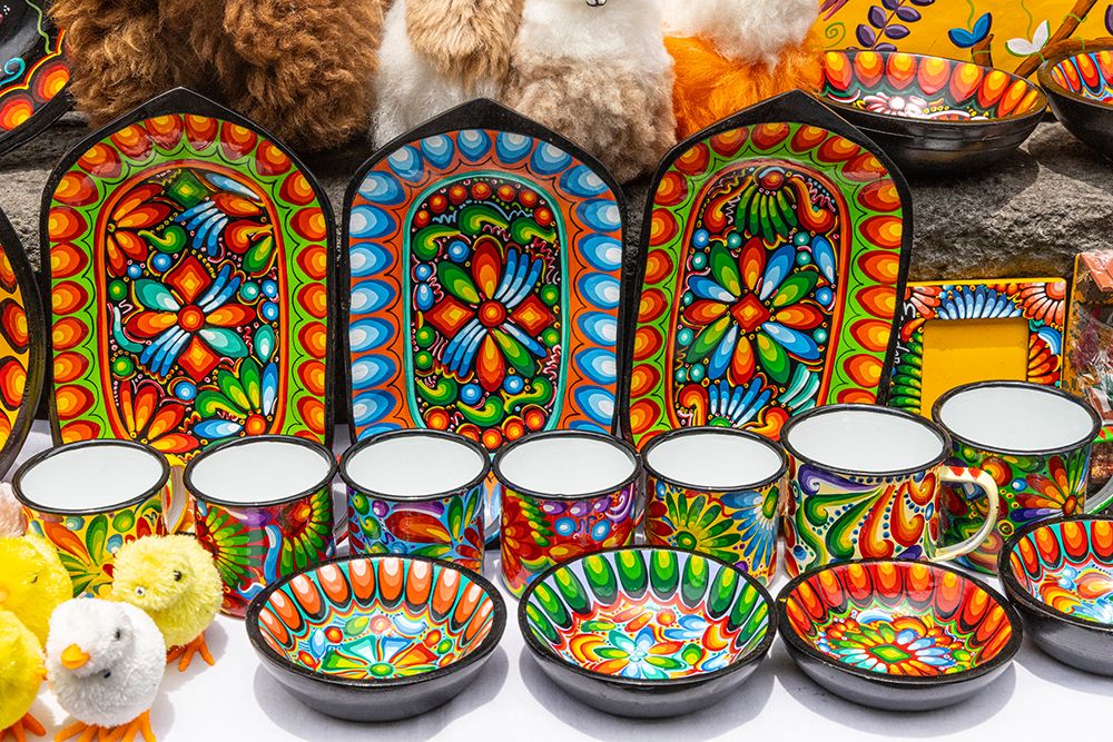 Colorful dishes, and stuffed ducks were on sale on the walls of the Basilica of Quito. art print by Mallorie Ostrowitz for $57.95 CAD